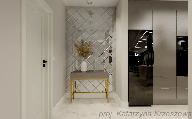 Przedpokój z lustrzanym wykończeniem, minimalistyczny i nowoczesny. Stół z dekoracjami.