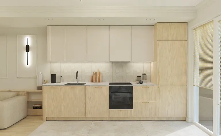 Kuchnia w stylu minimalistycznym z drewnianymi meblami i nowoczesnymi akcentami.