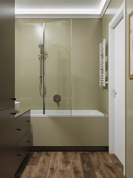 Nowoczesna łazienka z wanną, ciemnymi meblami i minimalistycznym designem.