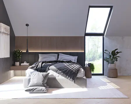 Wnętrze sypialni z szarym łóżkiem, drewnianymi detalami i dużymi oknami, minimalistyczny styl.