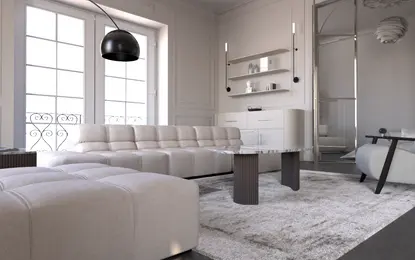 Współczesny salon z jasnymi meblami i czarną lampą.