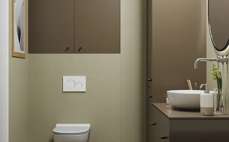 Wnętrze łazienki z brązowymi meblami, minimalistycznym wykończeniem, nowoczesnym designem.