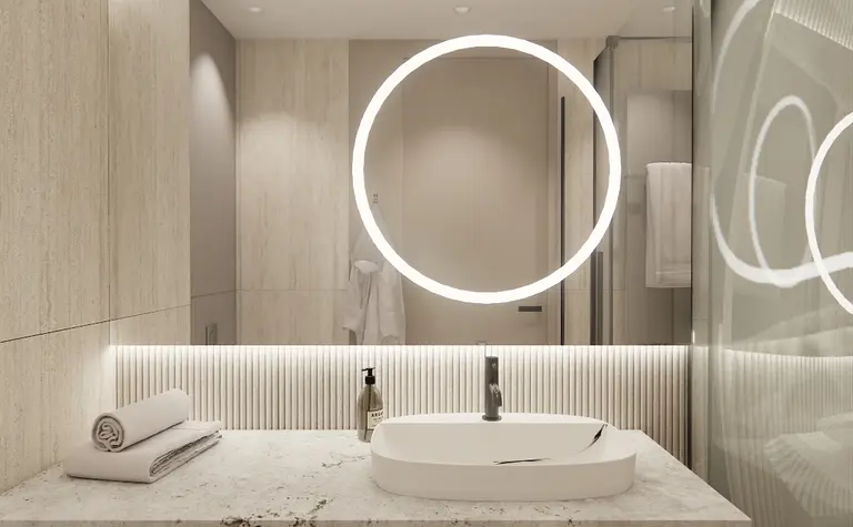 Nowoczesna łazienka z boho i minimalistycznymi elementami, szarymi płytkami i oświetleniem LED.