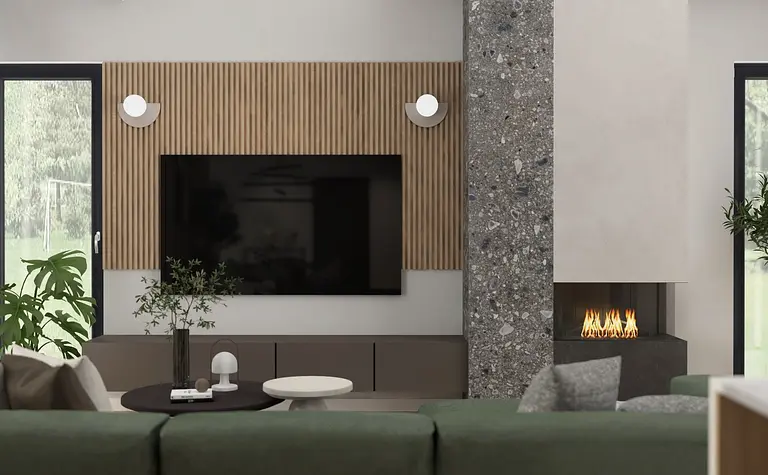 Wnętrze salonu z zieloną kanapą, drewnianymi detalami i industrialnym kominkiem.
