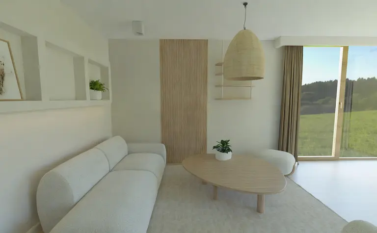 Wnętrze salonu z meblami w stylu boho i japandi