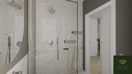 Nowoczesna łazienka z minimalistycznym wystrojem, szarymi płytkami i białymi detalami.