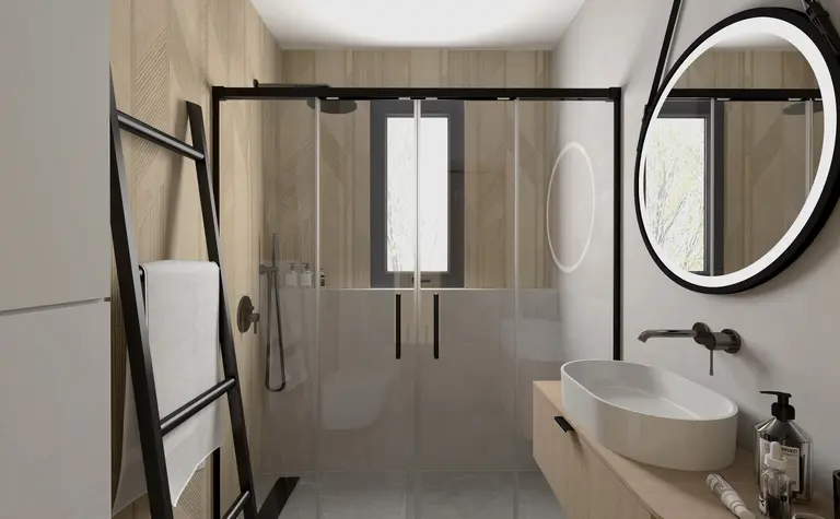 Wnętrze łazienki z drewnianymi ścianami, białą umywalką i nowoczesnym lustrem w stylu industrialnym.
