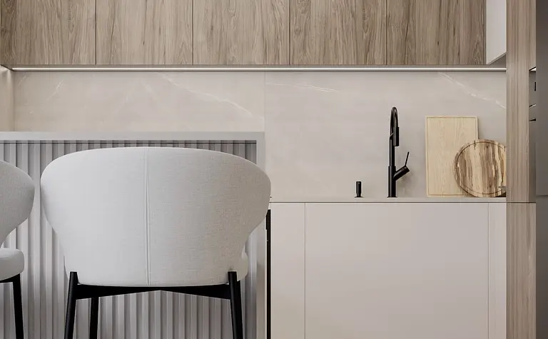 Wnętrze kuchni w stylu minimalistycznym z drewnianymi detalami i nowoczesnymi meblami.