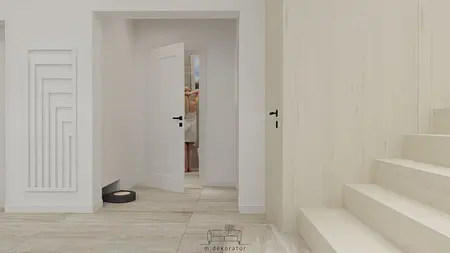 Przedpokój z białymi ścianami, drewnianą podłogą i nowoczesnymi detalami.