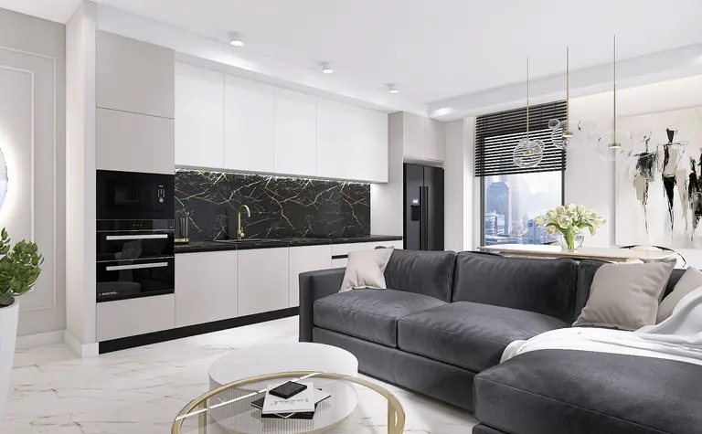 Wnętrze kuchni w stylu minimaluxe z czarnym blatem, nowoczesnymi meblami i detalami quiet luxury.