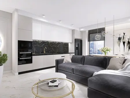 Wnętrze kuchni w stylu minimaluxe z czarnym blatem, nowoczesnymi meblami i detalami quiet luxury.