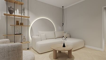 Wnętrze salonu w stylu soft minimalizm z jasną sofą i drewnianymi akcentami.