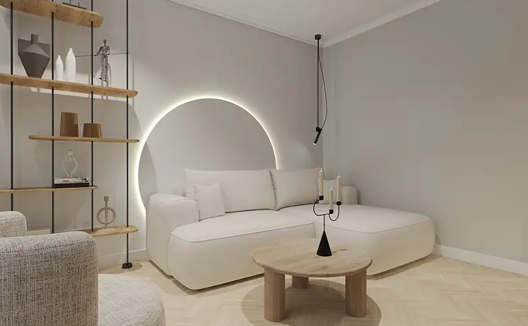 Wnętrze salonu w stylu soft minimalizm z jasną sofą i drewnianymi akcentami.