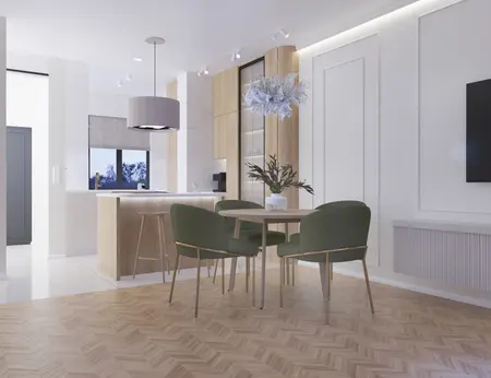 Wnętrze jadalni w stylu art deco i glamour z drewnianym stołem oraz zielonymi krzesłami.