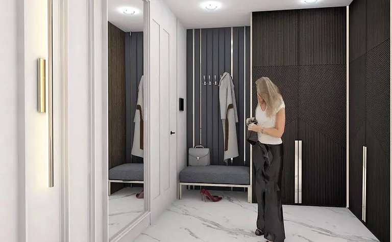 Przedpokój w stylu glamour z białymi meblami i czarnymi detalami.