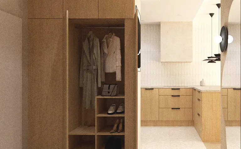 Wnętrze garderoby w stylu japandi, minimalistycznym i współczesnym z drewnianymi meblami.