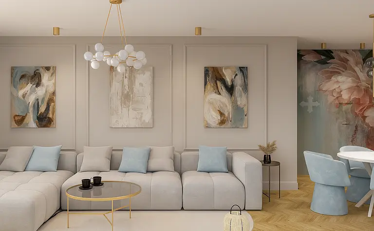 Wnętrze salonu z szarym narożnikiem i dekoracjami w stylu quiet luxury.