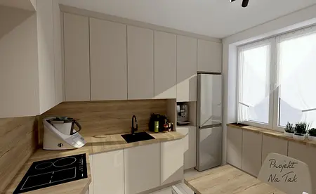 Wnętrze kuchni z jasnymi meblami i drewnianym blatem, nowoczesny design.