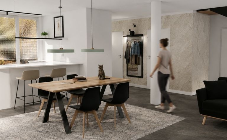 Jadalnia z minimalistycznym wystrojem, drewniany stół, czarne krzesła, nowoczesne detale.
