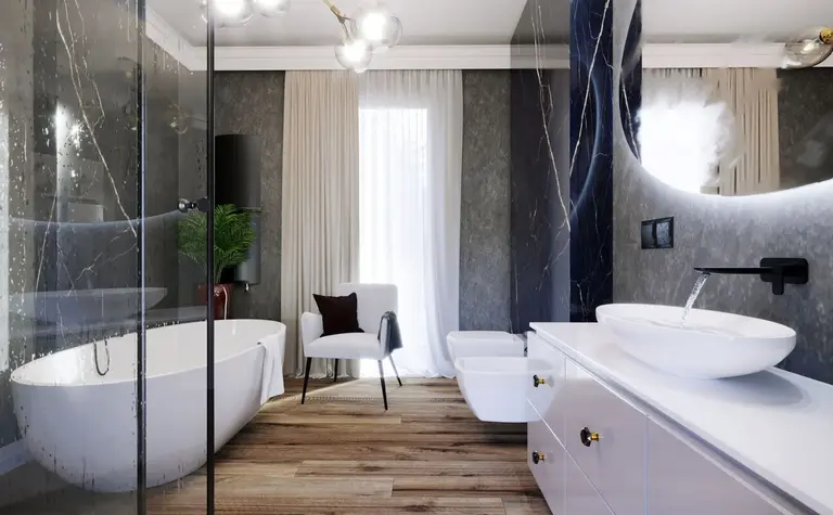 Nowoczesna łazienka z wanną, lustrem i eleganckimi detalami, w stylu glamour i quiet luxury.