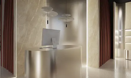 Wnętrze biura w stylu glamour i minimalistycznym z nowoczesnym biurkiem