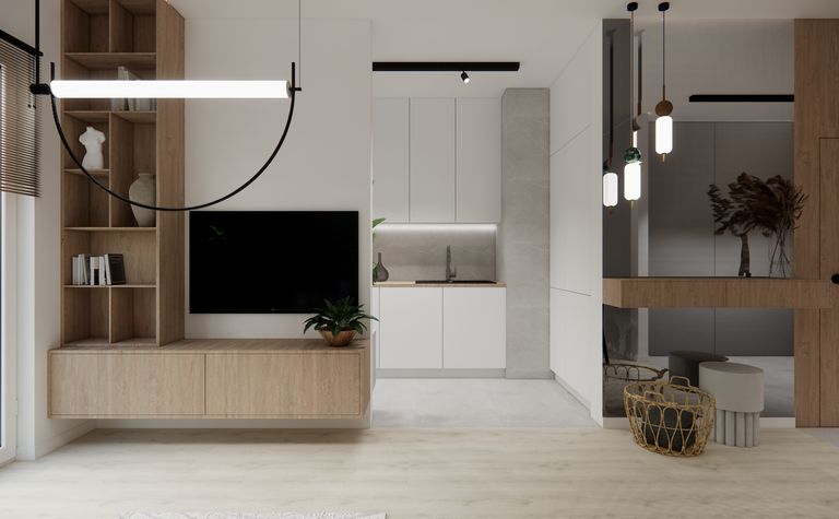 Wnętrze kuchni w stylu minimalistycznym z drewnianymi elementami