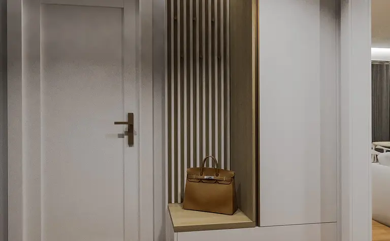 Nowoczesny przedpokój z białymi meblami, drewnianymi detalami i torbą, styl quiet luxury