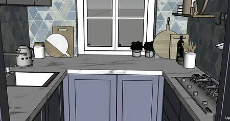 Kuchnia z niebieskimi kafelkami, drewnianymi detalami, minimalistyczne akcesoria i rośliny.
