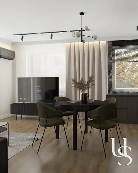 Wnętrze pokoju z drewnianym stołem, zielonymi krzesłami w stylu quiet luxury i współczesnym.