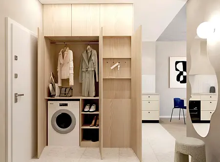 Garderoba w stylu japandi, minimalistycznym, współczesnym z pralką i drewnianymi akcentami.