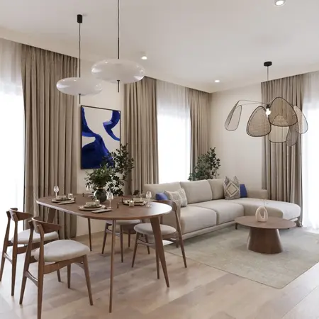 Współczesny salon z jasną sofą, drewnianym stołem i roślinami.
