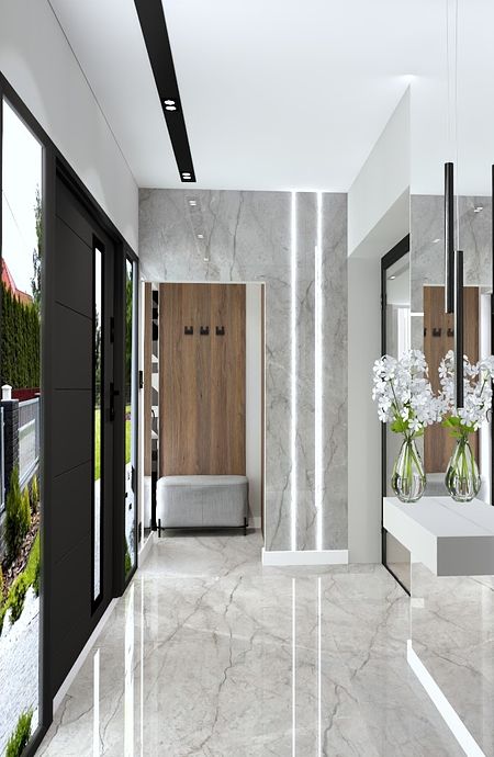 Nowoczesny przedpokój z marmurową podłogą, drewnianymi elementami i dużymi lustrami.