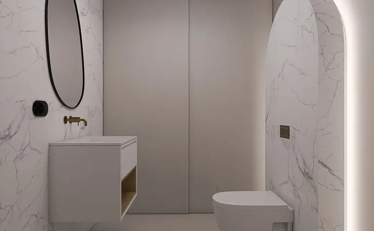 Nowoczesna łazienka z minimalistycznym designem, białą umywalką i marmurową ścianą.