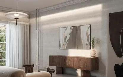 Wnętrze salonu w stylu art deco, japandi i vintage z drewnianą komodą.