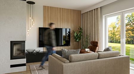 Wnętrze salonu z brązowym fotelem, telewizorem i nowoczesnym oświetleniem