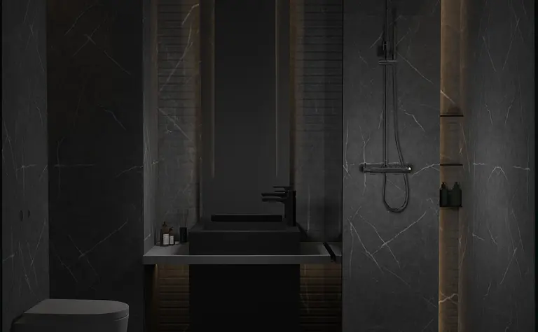 Minimalistyczna łazienka z czarnym umywalką i szarymi płytkami