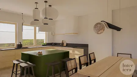Kuchnia w stylu japandi i minimalistycznym z zieloną wyspą i drewnianymi meblami.