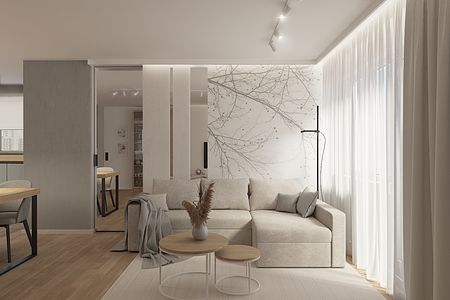 Wnętrze salonu w stylu skandynawskim z beżową sofą i drewnianymi akcentami.