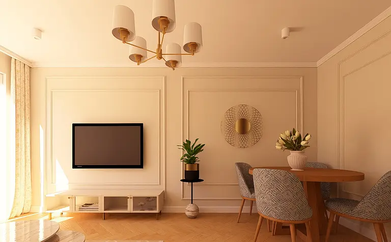 Wnętrze salonu z jasnymi meblami, telewizorem i roślinami