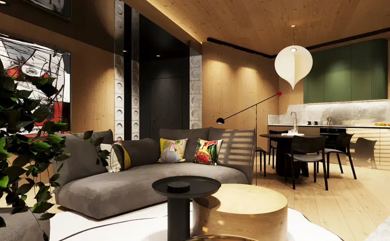 Wnętrze salonu z szarym narożnikiem, eklektycznymi akcentami i zieloną kuchnią w stylu dopamine decor.