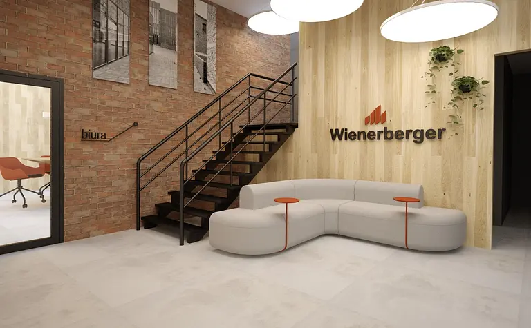 Wnętrze biura z szarymi meblami, drewnianymi elementami, minimalistyczny styl.