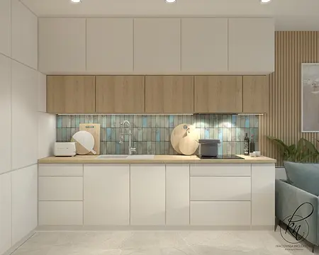 Nowoczesna kuchnia z białymi meblami i drewnianym blatem, minimalistyczny design.