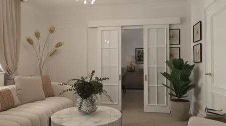 Wnętrze salonu w stylu art deco z białą sofą i rośliną