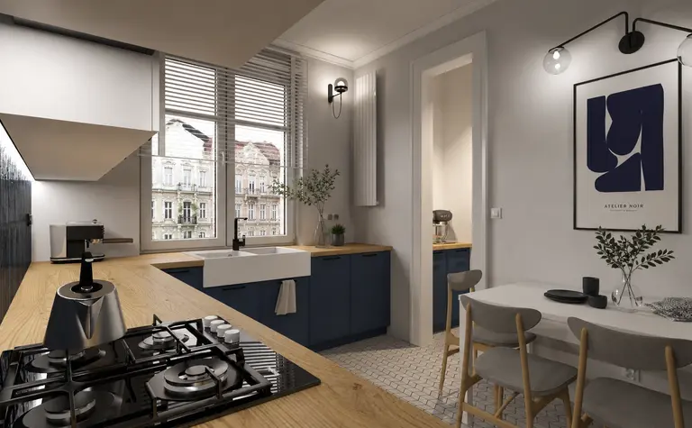 Kuchnia w stylu art deco i minimalistycznym z niebieskimi meblami i drewnianym blatem.