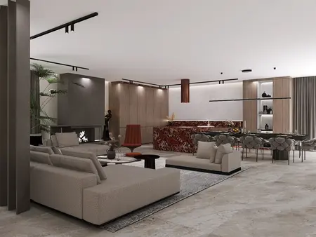 Salon z beżowymi sofami, marmurowym blatem i elementami glamour.