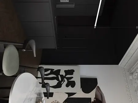 Nowoczesna kuchnia w stylu art deco z czarnymi meblami i białym blatem, eklektyczne detale.