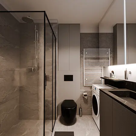 Wnętrze łazienki z prysznicem, szarymi płytkami i czarnym WC, minimalistyczny styl