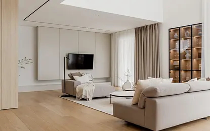 Wnętrze salonu w stylu japandi i minimalistycznym z jasnymi meblami.