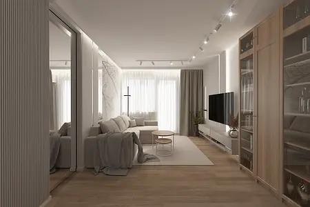 Wnętrze salonu w stylu skandynawskim z szarymi meblami i drewnianą podłogą.