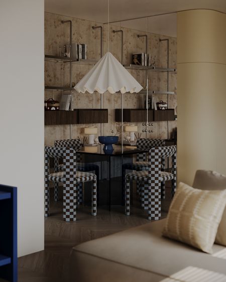 Wnętrze jadalni w stylu art deco i eklektycznym z nowoczesnymi akcentami.